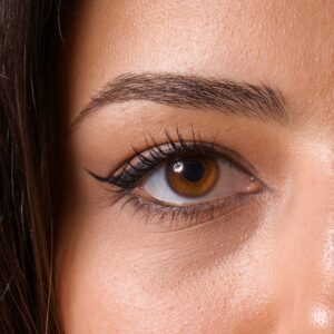 Close-up of a woman's eye with makeup.