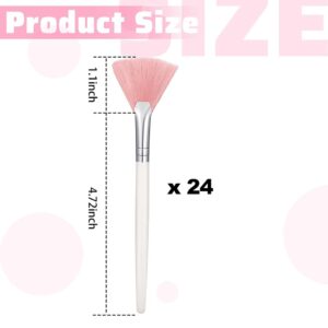 White fan makeup brush with pink bristles.