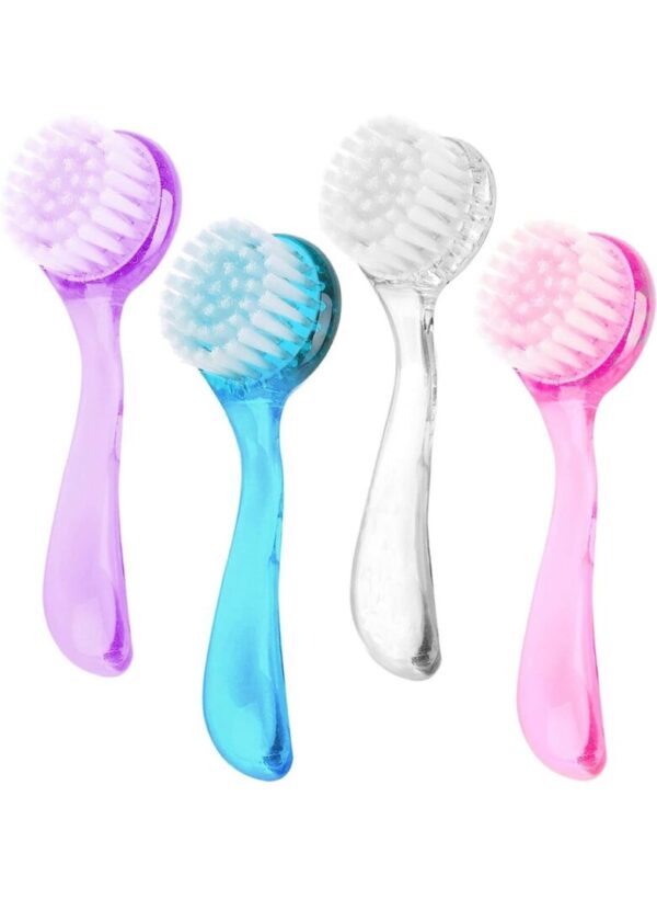 Four colorful facial scrub brushes.