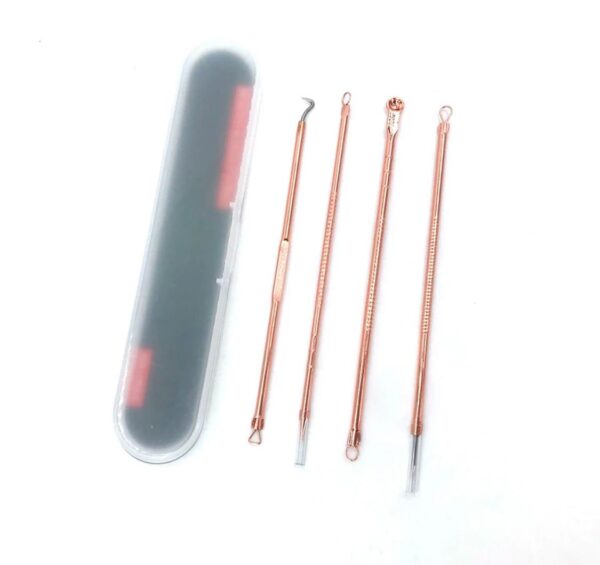 Rose gold blackhead remover tools in case.