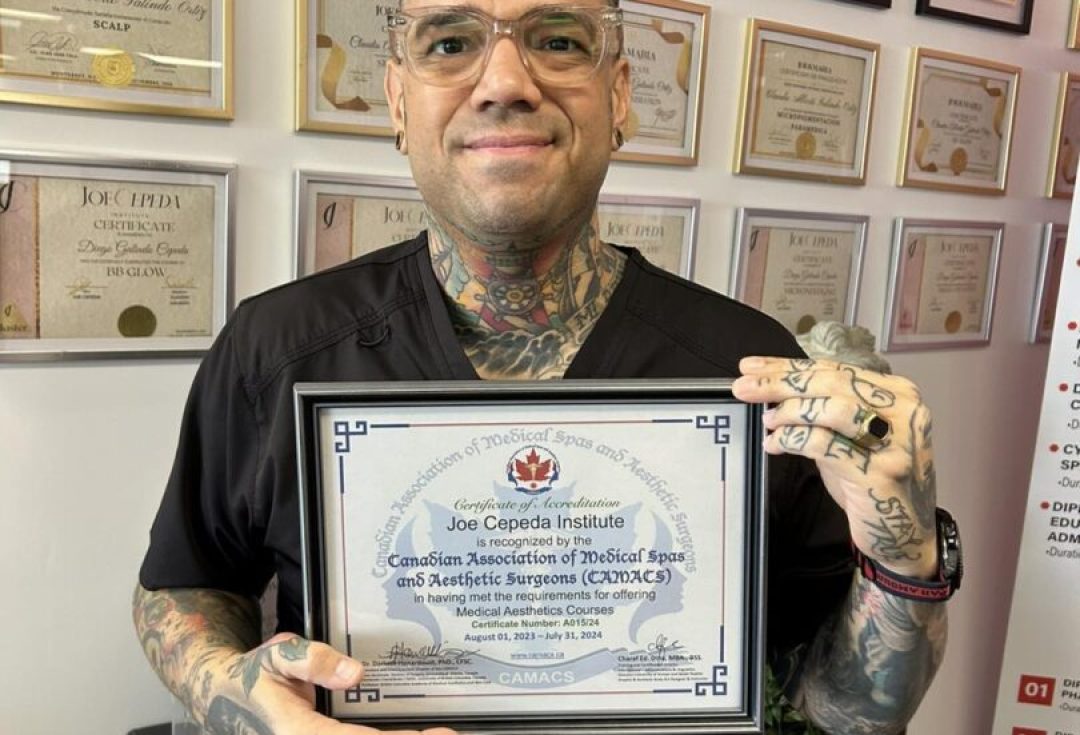 Man holding certificate for medical spa.